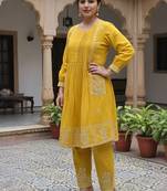 Women Ethnic Motifs Embroidered Panelled Thread Work Cotton Kurta with Trousers
