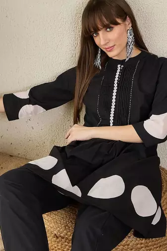 Women Geometric Printed Cotton A-Line Kurta with Trousers