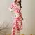 Women Peach Floral Printed Regular Kurta with Trousers