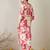 Women Peach Floral Printed Regular Kurta with Trousers