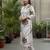 Women Floral Printed Regular Thread Work Pure Cotton Kurta with Trousers
