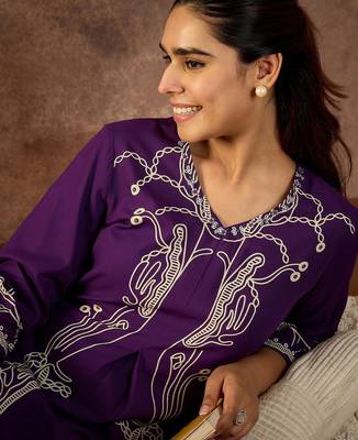 Women Printed Regular Beads and Stones Kurta with Palazzos 6