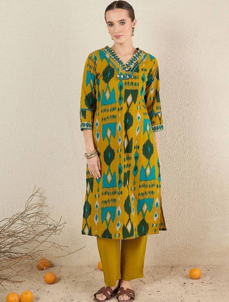 Women Abstract Printed Cotton Kurta with Trousers & Dupatta