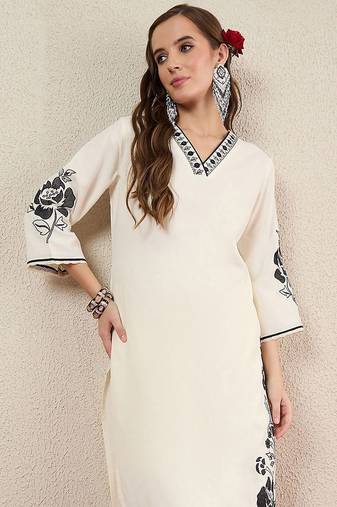 Women Solid Embroidered Kurta with Trousers