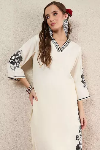 Women Solid Embroidered Kurta with Trousers