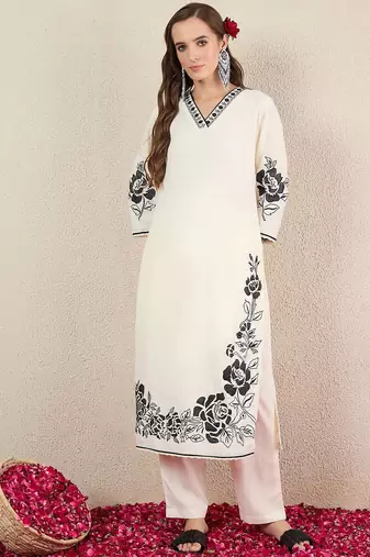 Women Solid Embroidered Kurta with Trousers