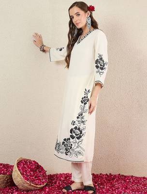 Women Solid Embroidered Kurta with Trousers 4