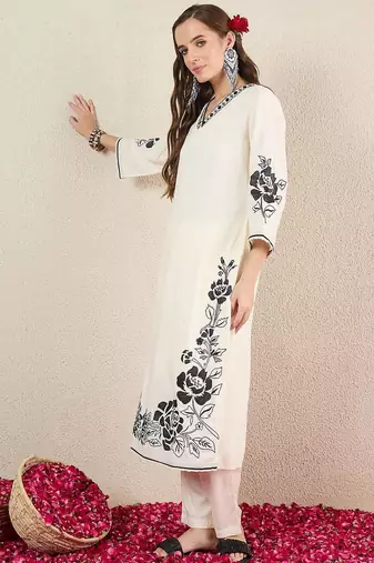 Women Solid Embroidered Kurta with Trousers