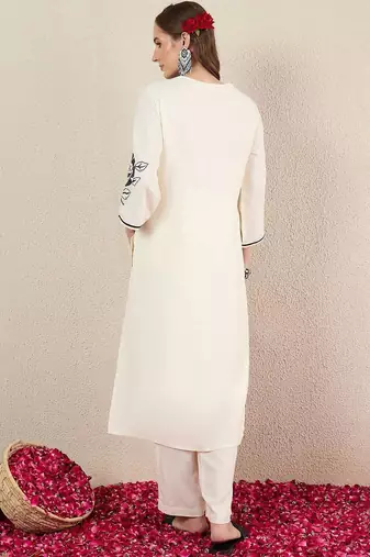 Women Solid Embroidered Kurta with Trousers