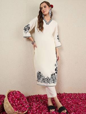 Women Solid Embroidered Kurta with Trousers 6