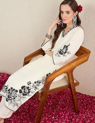 Women Solid Embroidered Kurta with Trousers 7