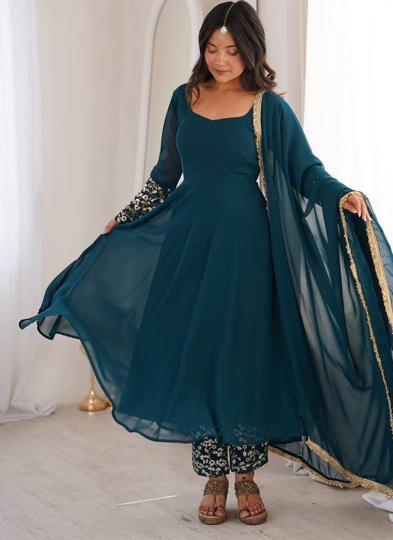Teal blue sequins embroidered georgette gown with pant & dupatta