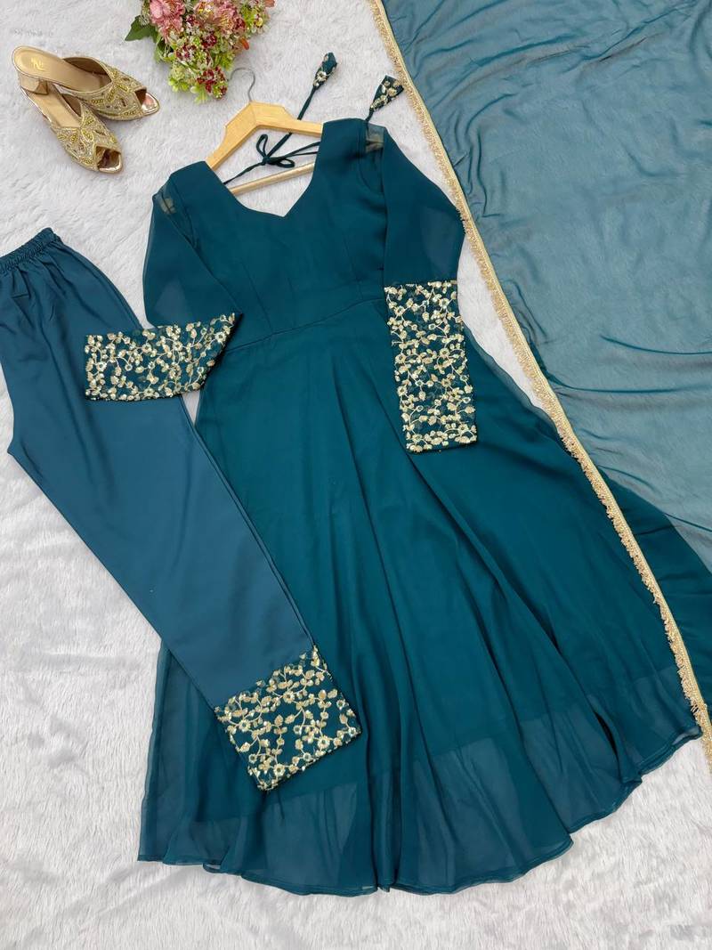Teal blue sequins embroidered georgette gown with pant & dupatta