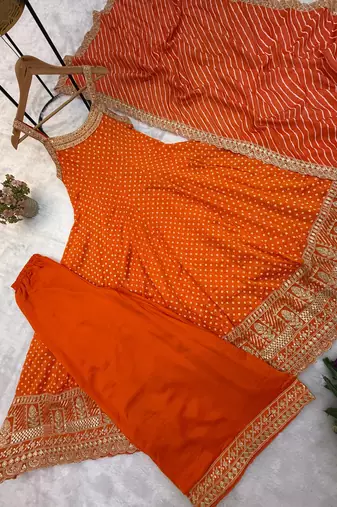 Orange embroidery & mirror work vichitra silk gown with palazzo & dupatta