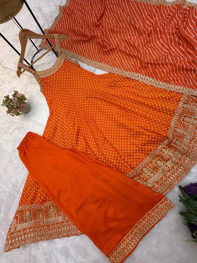 Orange embroidery & mirror work vichitra silk gown with palazzo & dupatta