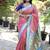 Onion pink paithani silk blend saree with contrast blue zari border