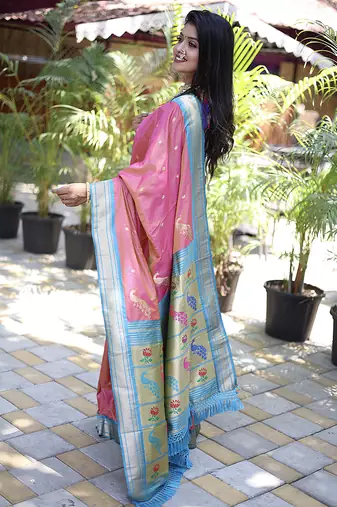 Onion pink paithani silk blend saree with contrast blue zari border