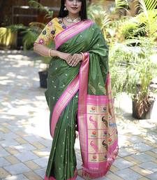 Mehendi green paithani silk blend saree with contrast magenta pink zari border