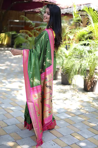 Mehendi green paithani silk blend saree with contrast magenta pink zari border