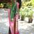 Mehendi green paithani silk blend saree with contrast magenta pink zari border