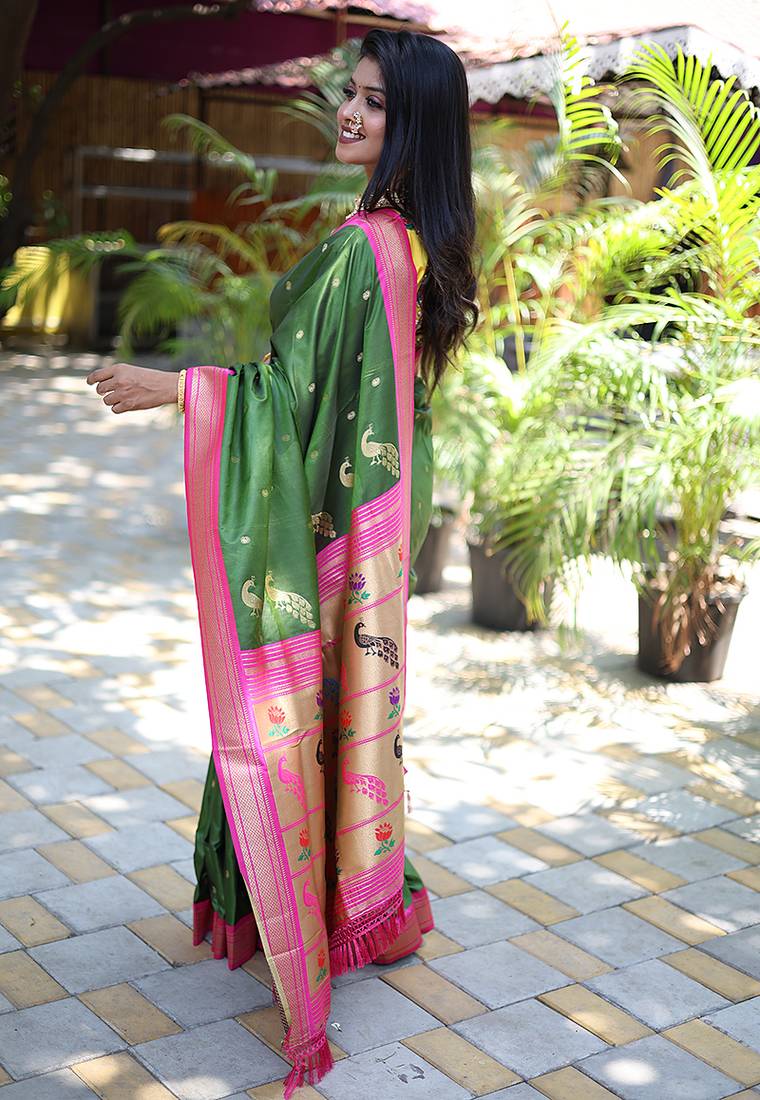 Mehendi green paithani silk blend saree with contrast magenta pink zari border