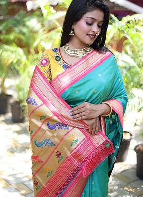 Turquoise paithani silk blend saree with contrast pink zari border 4