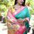 Turquoise paithani silk blend saree with contrast pink zari border