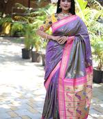 Lavender purple paithani silk blend saree with contrast pink zari border