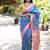 Light blue paithani silk blend saree with contrast pink zari border