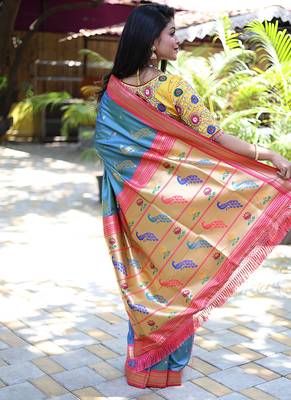 Light blue paithani silk blend saree with contrast pink zari border 2