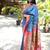 Light blue paithani silk blend saree with contrast pink zari border
