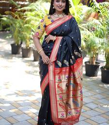 Black paithani silk blend saree with contrast red zari border