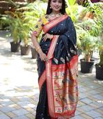 Black paithani silk blend saree with contrast red zari border