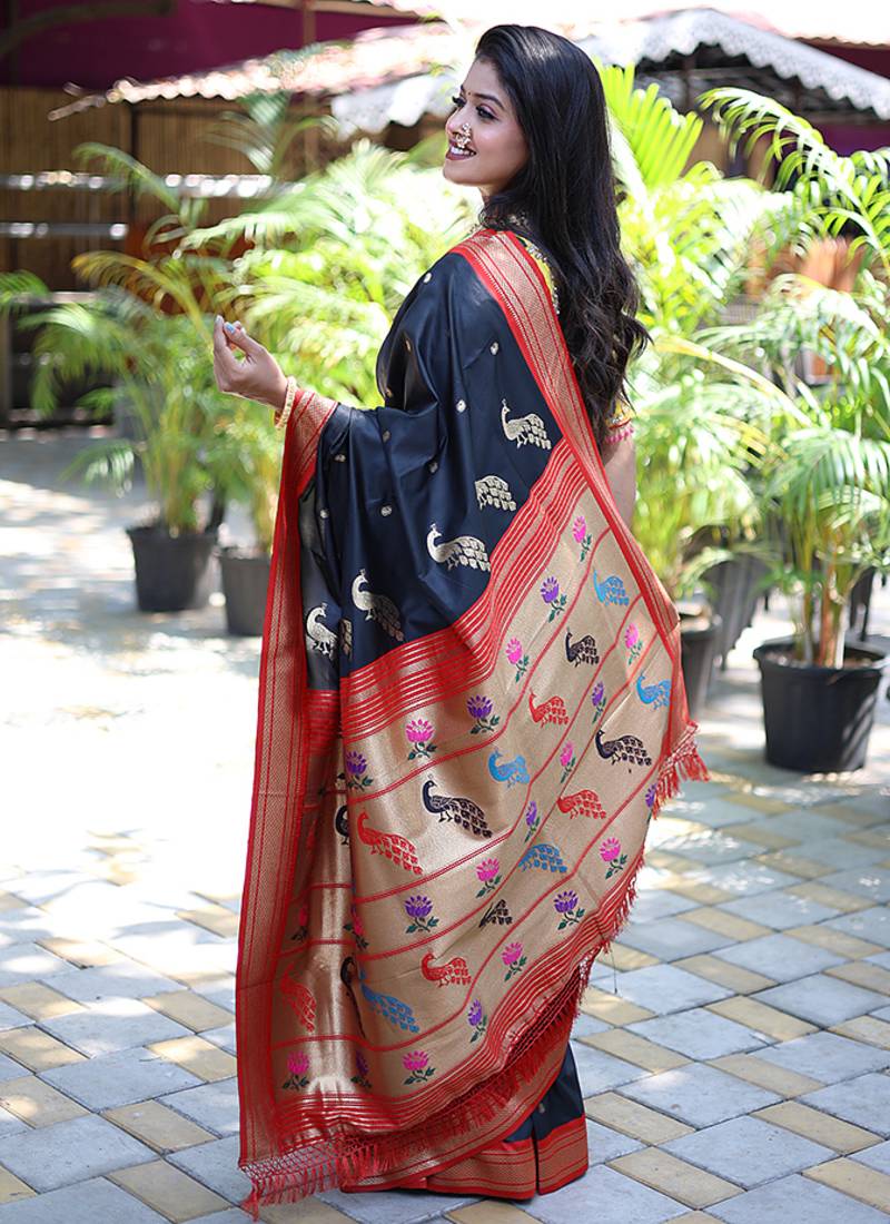 Black paithani silk blend saree with contrast red zari border