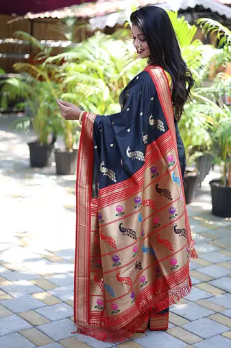 Black paithani silk blend saree with contrast red zari border