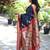 Black paithani silk blend saree with contrast red zari border
