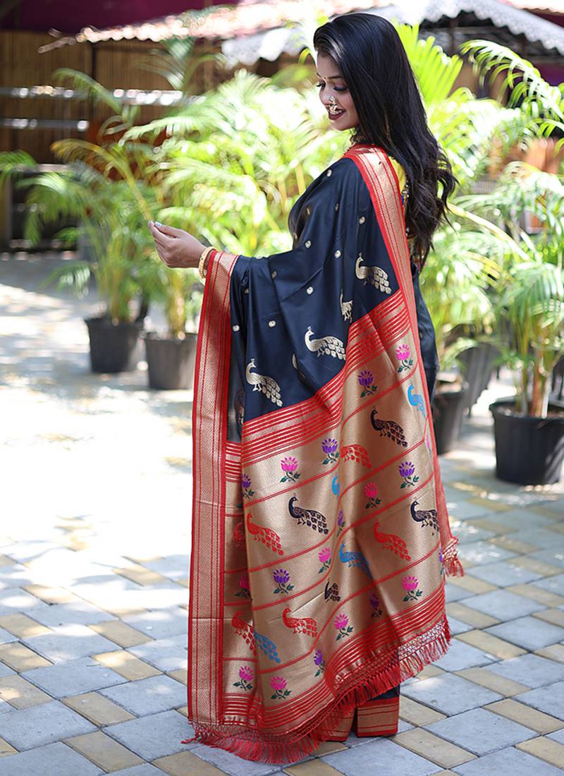 Black paithani silk blend saree with contrast red zari border