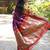 Purple paithani silk blend saree with contrast red zari border