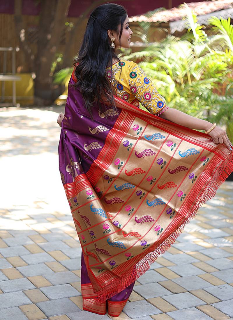 Purple paithani silk blend saree with contrast red zari border