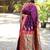 Purple paithani silk blend saree with contrast red zari border