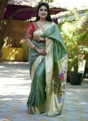 Green paithani silk blend saree with floral & peacock motifs 1
