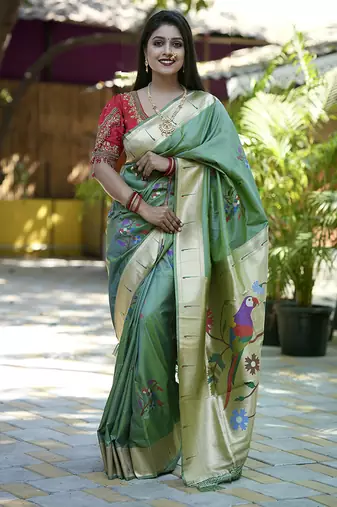 Green paithani silk blend saree with floral & peacock motifs