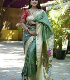Green paithani silk blend saree with floral & peacock motifs