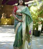 Green paithani silk blend saree with floral & peacock motifs