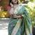 Green paithani silk blend saree with floral & peacock motifs
