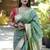 Green paithani silk blend saree with floral & peacock motifs