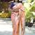 Peach paithani silk blend saree with floral & peacock motifs