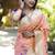 Peach paithani silk blend saree with floral & peacock motifs