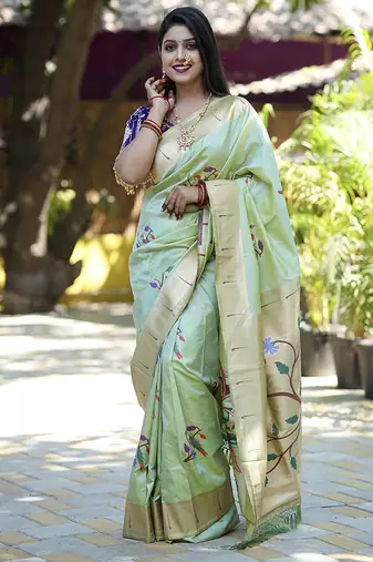 Mint green paithani silk blend saree with floral & peacock motifs