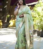 Mint green paithani silk blend saree with floral & peacock motifs